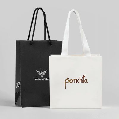 Op maat gemaakte opvouwbare recycled paper gift bags Boetiek papieren tassen met handvaten