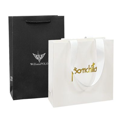 Op maat gemaakte opvouwbare recycled paper gift bags Boetiek papieren tassen met handvaten