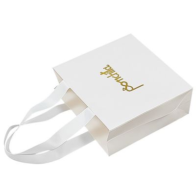 Op maat gemaakte opvouwbare recycled paper gift bags Boetiek papieren tassen met handvaten