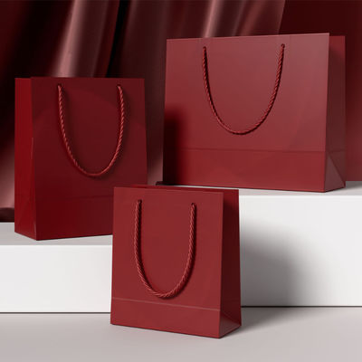 Op maat gemaakte kledingwinkel tassen verpakking luxe ivoorkarton kraftpapier winkelen cadeauzak op maat logo