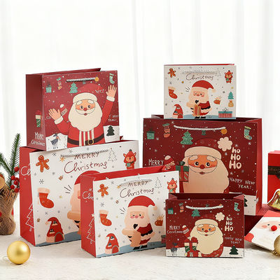 Kersttassen van Kraftpapier met bedrukking in aangepaste formaten, luxe cadeauzakken met lint